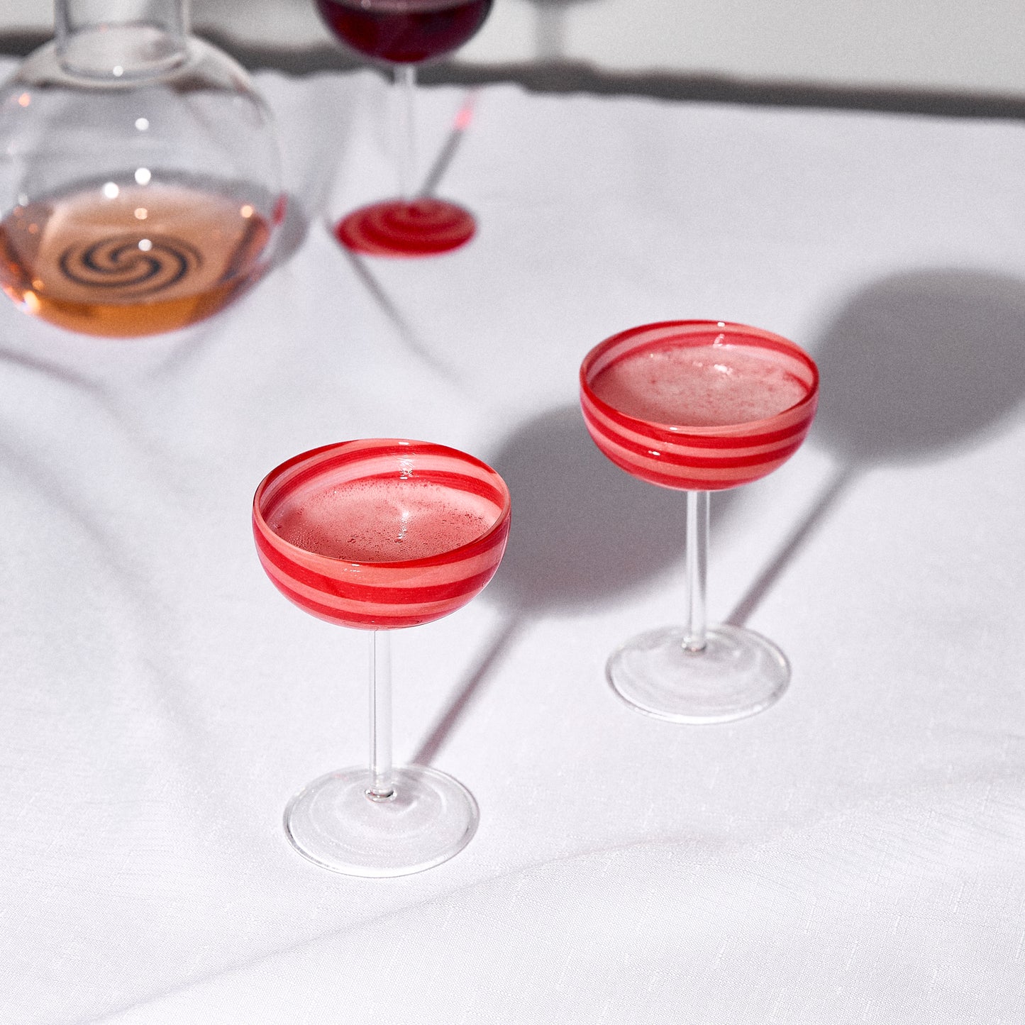 TWO X SWIRL COUPE GLASSES - RED/PINK