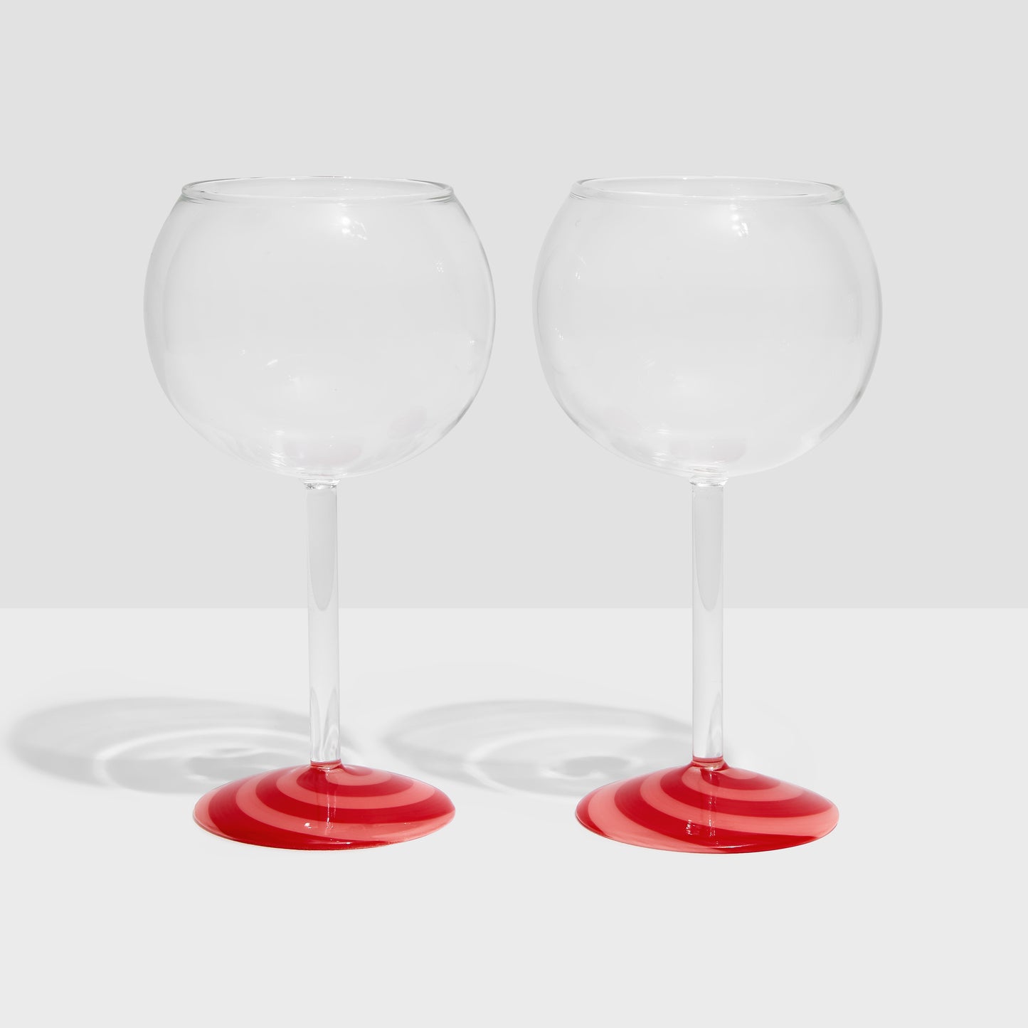 TWO X SWIRL WINE GLASSES - RED/PINK